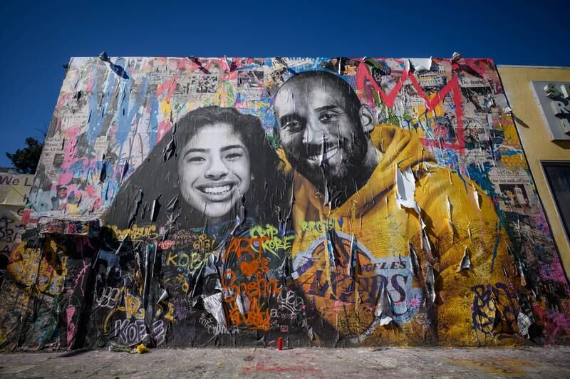 A mural depicting the late basketball player Kobe Bryant and his daughter Gianna, by artist Mr Brainwash, in Los Angeles. Bryant and Gianna died in a helicopter crash in California on January 26, 2020. Getty Images