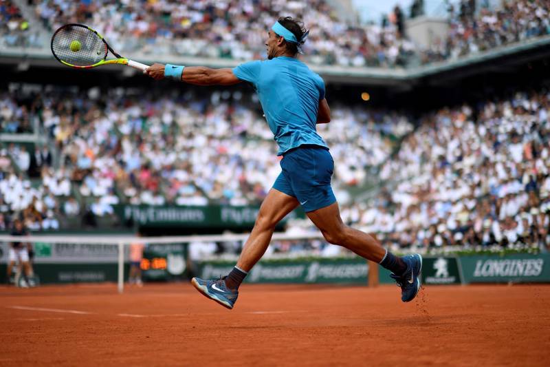 Spain's Rafael Nadal plays a forehand return to Austria's Dominic Thiem during their French Open men's singles final in Paris.  Christophe Simon / AFP