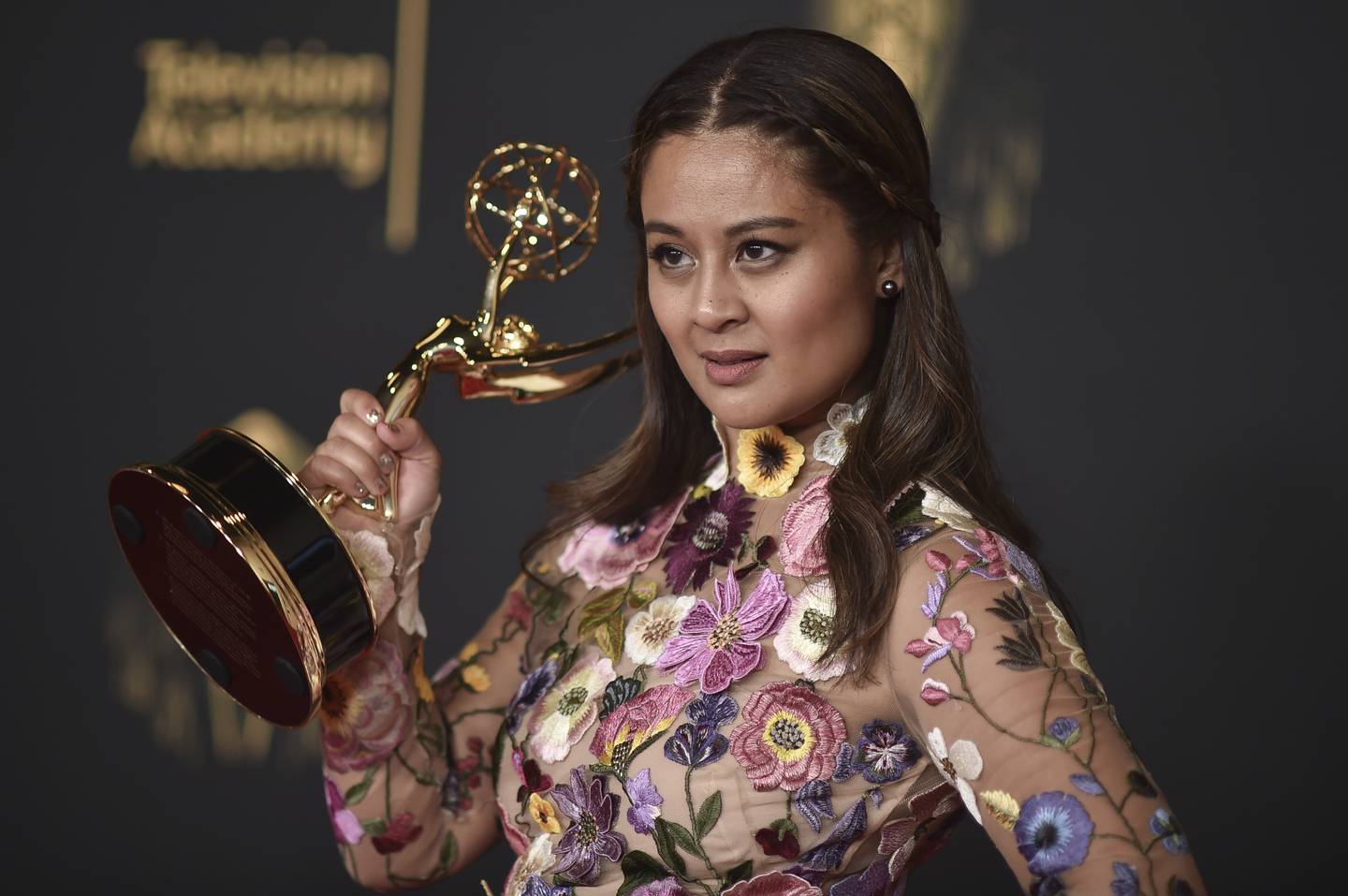 Michelle Tesoro poses with the award for Outstanding Single-Camera Picture Editing for a Limited or Anthology Series or Movie, for 'The Queen's Gambit' at the Creative Arts Emmy Awards. AP