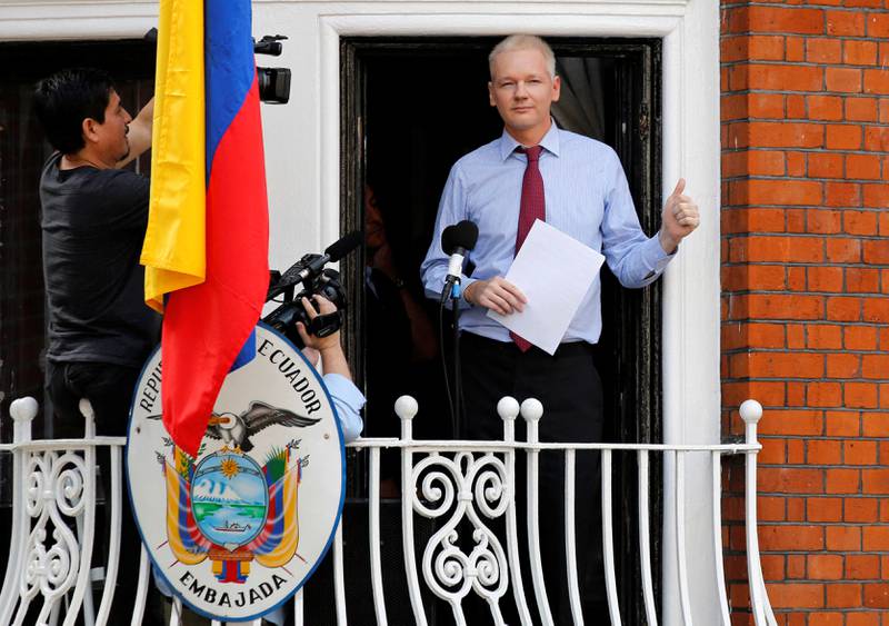 Mr Assange prepares to speak from the balcony of Ecuador's embassy in August 2012. Reuters