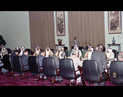 Sheikh Zayed meets with a Chinese delegation while accompanied by Sheikhs and officials during his visit to China in 1990. Courtesy National Archives