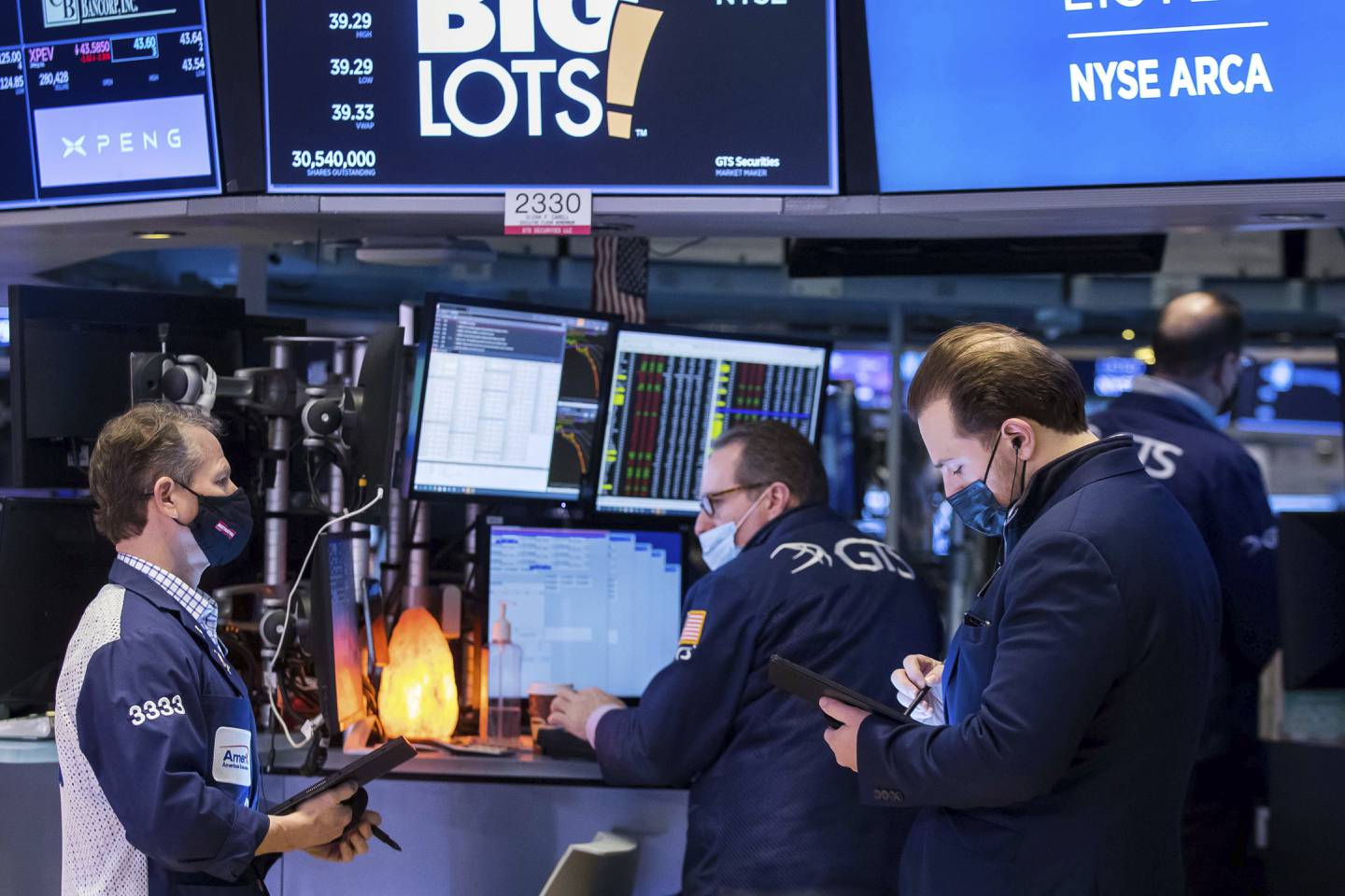 Traders work on the New York Stock Exchange floor on January  21, 2022. AP