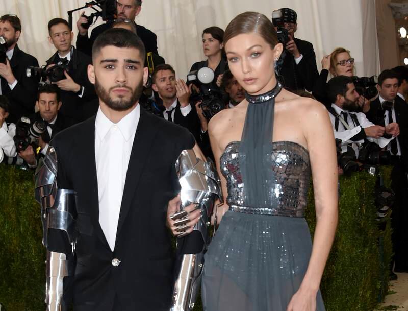 FILE - In this May 2, 2016 file photo, Zayn Malik, left, and Gigi Hadid arrive at The Metropolitan Museum of Art Costume Institute Benefit Gala in New York. Hadid and Malik are confirming on social media that their romance is over. The 22-year-old model and 25-year-old musician each posted on Twitter Tuesday about the end of their two-year relationship. (Photo by Evan Agostini/Invision/AP, File)