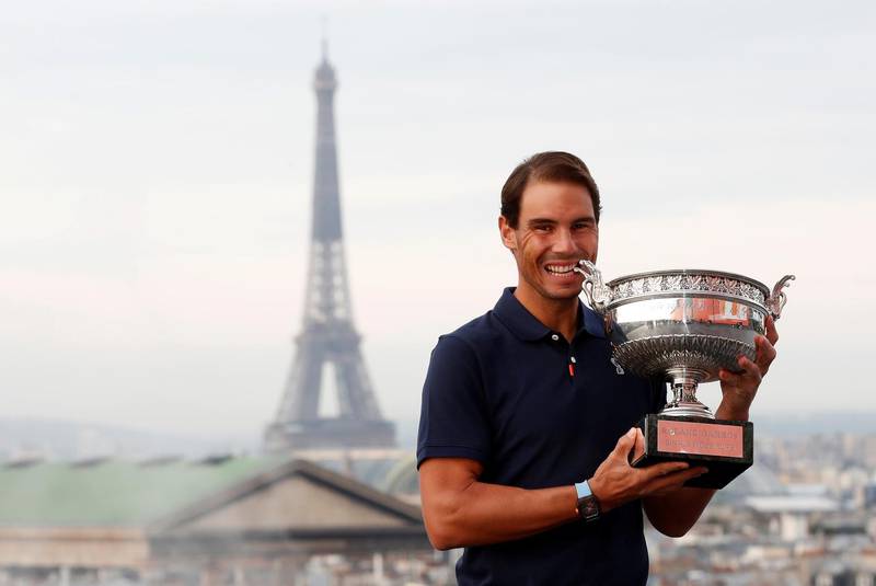 Rafael Nadal poses with the French Open trophy on the Galeries Lafayette Rooftop, Paris. Reuters