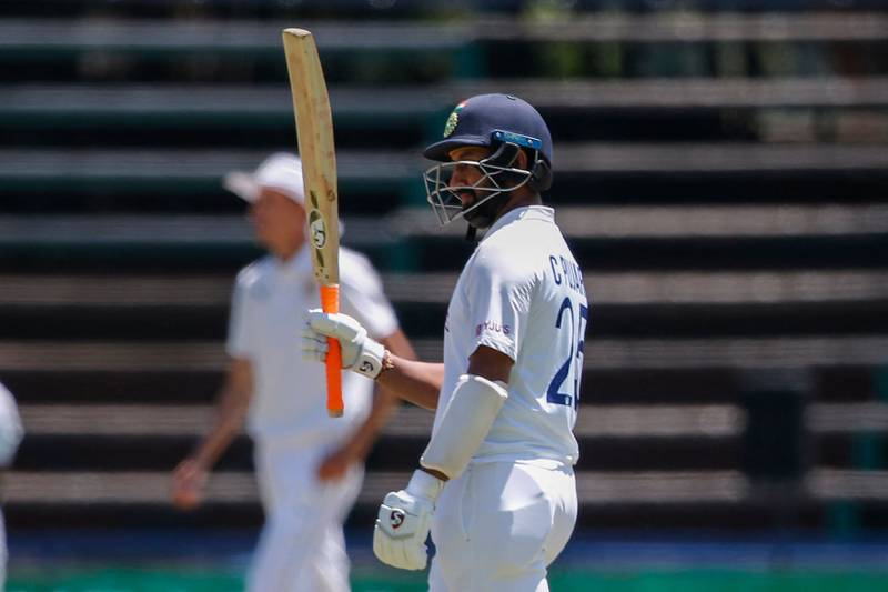 India batsman Cheteshwar Pujara after reaching his 50. AFP