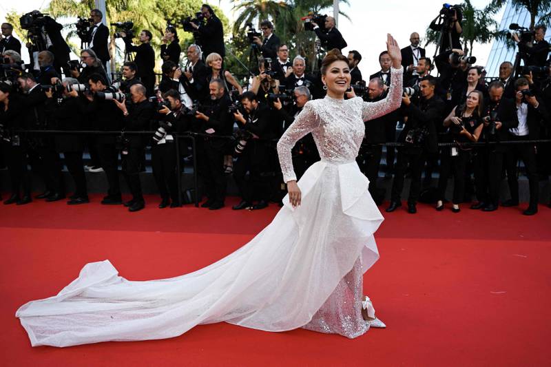Indian actress Urvashi Rautela arrives for the screening of the film 'Elvis'. AFP