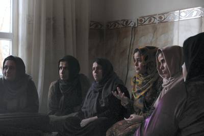 Women from the village of Gomasheen, in Iraqi Kurdistan, listen to a talk about the dangers of female genital mutilation, a practice still common in the region. Florian Neuhof for The National