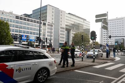Dutch police secure the area after a man was arrested following shootings in Rotterdam. Reuters