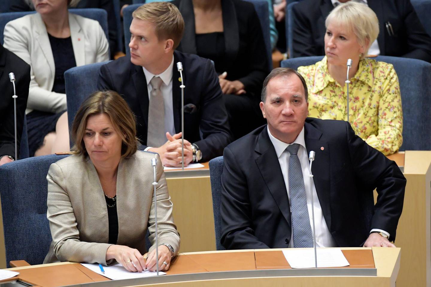 Swedish Prime Minister Stefan Lofven, right, attends parliament during a vote of confidence in the Swedish Parliament Riksdagen, Tuesday Sept. 25, 2018. The prime minister lost a vote of confidence in parliament, meaning he will have to step down. He will continue as caretaker prime minister until a new government can be formed. (Anders Wiklund/TT via AP)