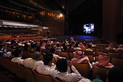 Saudis attend the "Short Film Competition 2" festival on October 20, 2017, at King Fahad Culture Center in Riyadh.
The rare movie night this week in Riyadh was a precursor to what is expected to be a formal lifting of the kingdom's ban on cinemas, long vilified as vulgar and sinful by religious hardliners. / AFP PHOTO / FAYEZ NURELDINE