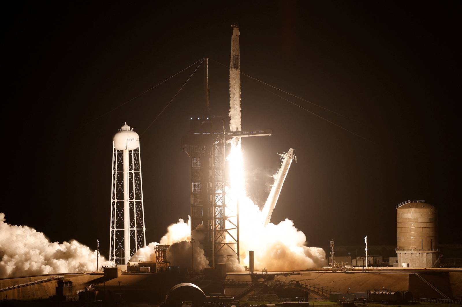 traveling A Falcon 9 rocket takes off on Nasa's SpaceX Crew-7 objective, taking 4 team members to the International Space Station (ISS), from the Kennedy Space Centre in Cape Canaveral, Florida, United States. Reuters