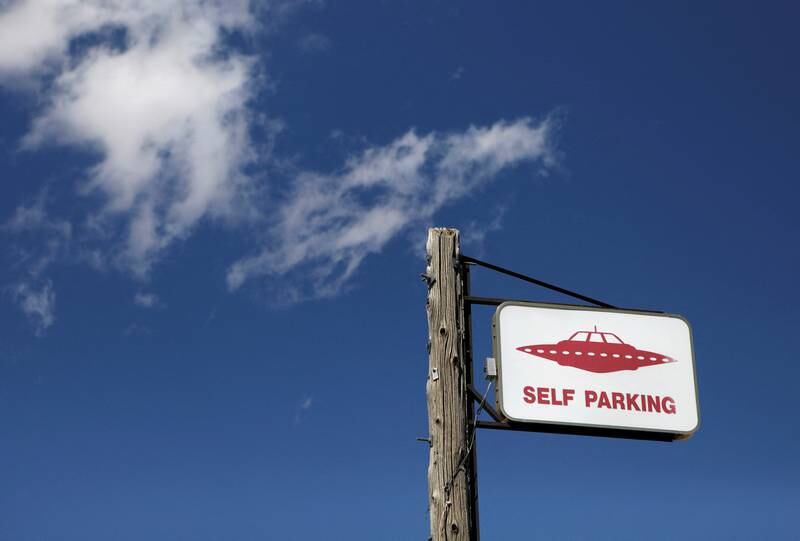FILE PHOTO: A parking sign at the Little A'Le'Inn as an influx of tourists responding to a call to 'storm' Area 51, a secretive U. S.  military base believed by UFO enthusiasts to hold government secrets about extra-terrestrials, is expected in Rachel, Nevada, U. S.  September 19, 2019.  REUTERS / Jim Urquhart / File Photo