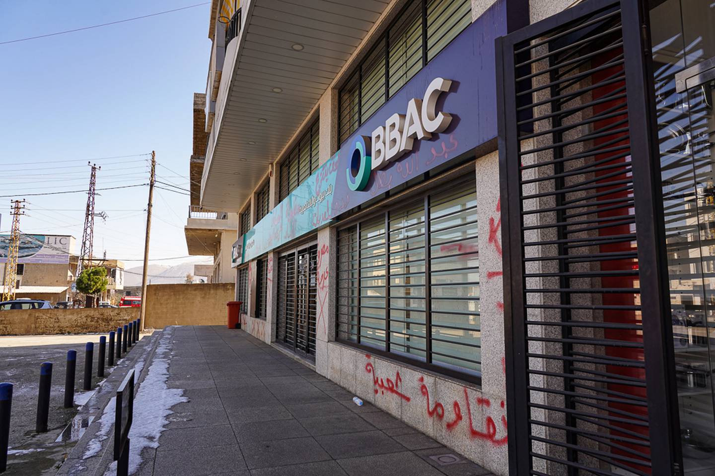 The local branch of BBAC bank in Jeb Jannine where Abdallah Assaii held staff hostage to withdraw his money. Graffiti on the walls proclaims support for Mr Assaii. Finbar Anderson/ The National