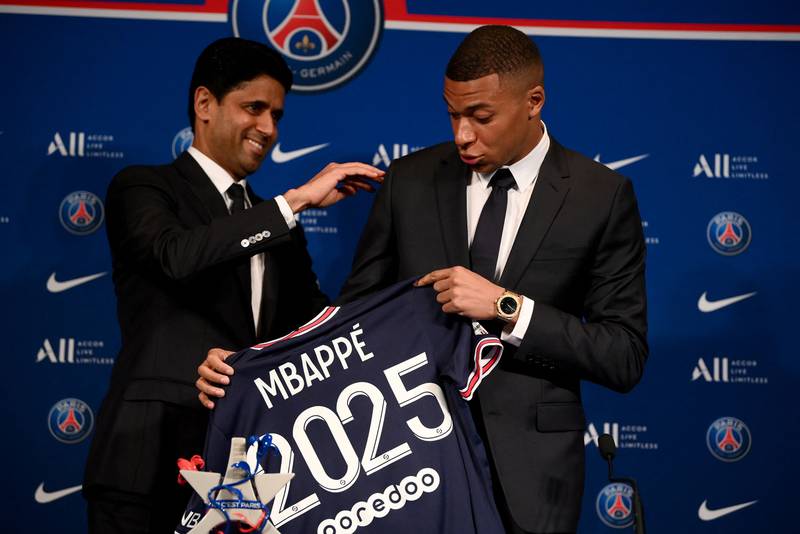 Nasser Al-Khelaifi and Kylian Mbappe at the end of a press conference at the Parc des Princes. AFP