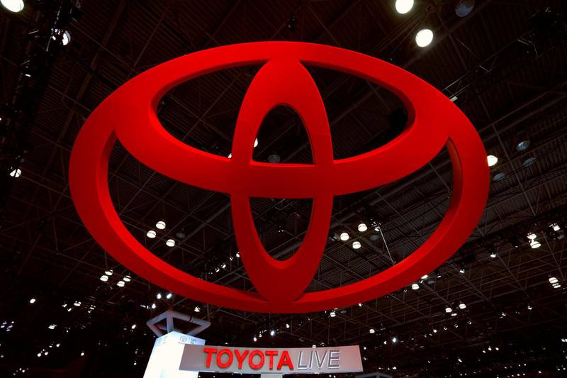 epa06636387 The Toyota logo looms high above the showroom floor during the media preview day two at the New York International Auto Show at the Jacob K. Javits Center in New York City, New York, USA, 29 March 2018. The show is open to the public from 30 March until 08 April 2018.  EPA/PETER FOLEY
