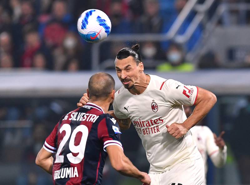 AC Milan's Zlatan Ibrahimovic in action with Bologna's Lorenzo De Silvestrii. AP