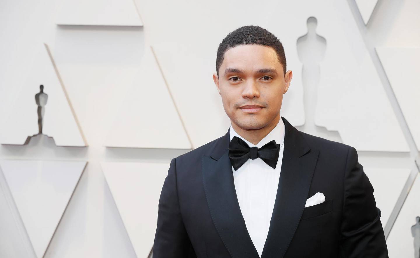 epa07394455 Trevor Noah arrives for the 91st annual Academy Awards ceremony at the Dolby Theatre in Hollywood, California, USA, 24 February 2019. The Oscars are presented for outstanding individual or collective efforts in 24 categories in filmmaking.  EPA/ETIENNE LAURENT