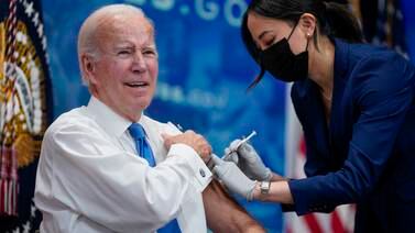 An image that illustrates this article Biden has updated Covid booster as US prepares for winter surge