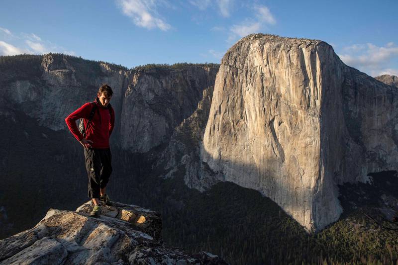 Alex Honnold atop Lower Cathedral with El Capitan in the background, Yosemite National Park, CA.  (National Geographic/Samuel Crossley)