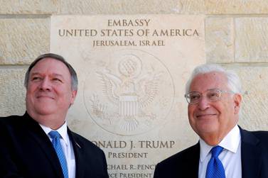 US Ambassador to Israel David Friedman, right, stands with Secretary of State Mike Pompeo next to the dedication plaque at the US embassy in Jerusalem. Reuters