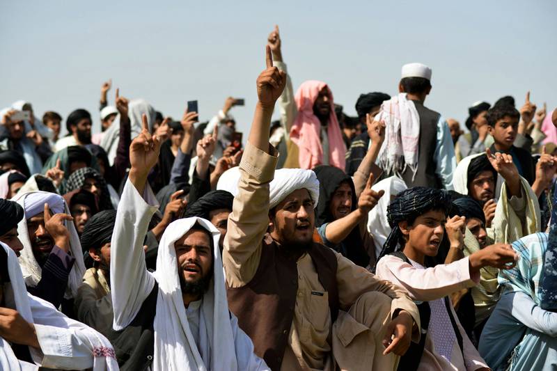 Taliban supporters gather in Kandahar to celebrate the withdrawal of all US troops from Afghanistan. AFP