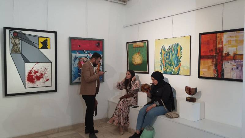 Artist Yuser Jalil, centre. 