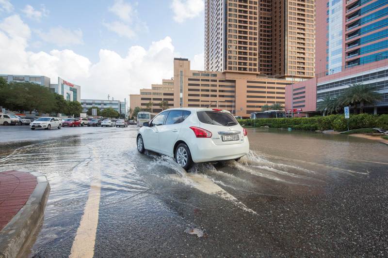 Dubai, United Arab Emirates - Flood water in a parking lot at Internet City.  Ruel Pableo