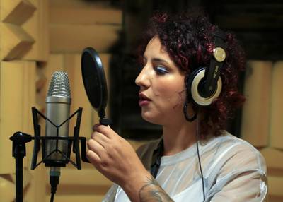 Moroccan rapper Houda Abouz, 24, known by her stage name "Khtek", records a song inside a studio in Rabat, Morocco July 20, 2020. Picture taken July 20, 2020. REUTERS/Shereen Talaat