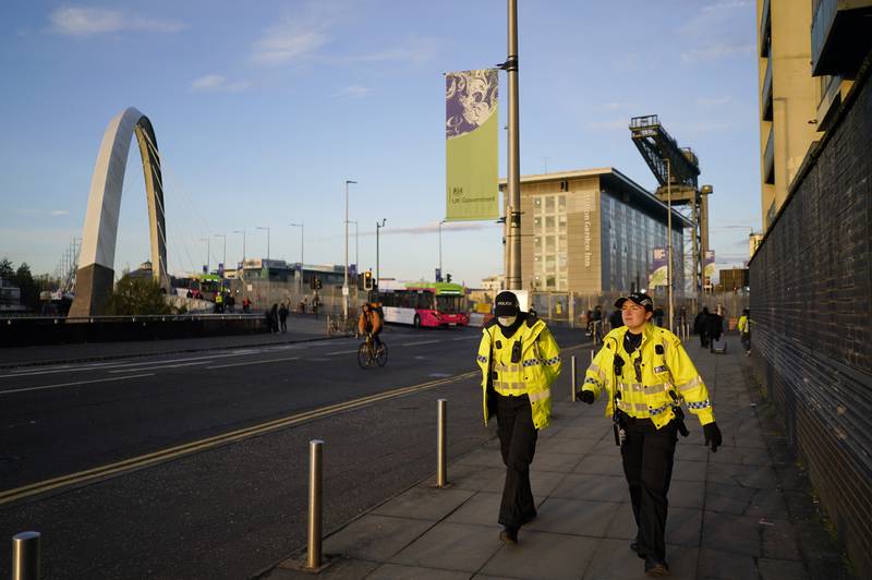 Police patrol outside the summit's venue. AP Photo