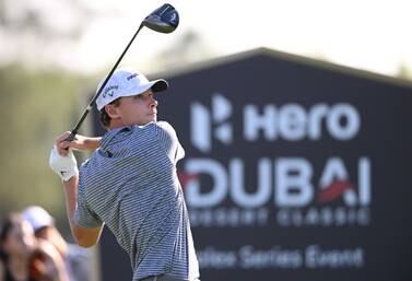 DUBAI, UNITED ARAB EMIRATES - JANUARY 29: Nicolai Hojgaard of Denmark tees off on the 18th hole during the Third Round on Day Four of the Hero Dubai Desert Classic at Emirates Golf Club on January 29, 2023 in Dubai, United Arab Emirates. (Photo by Ross Kinnaird / Getty Images)