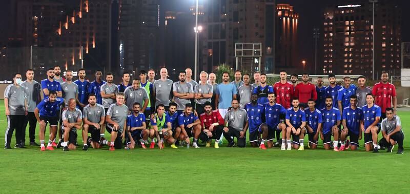 Sheikh Rashid bid Humaid Al Nuaimi, president of the FA, with the UAE national team squad and staff.