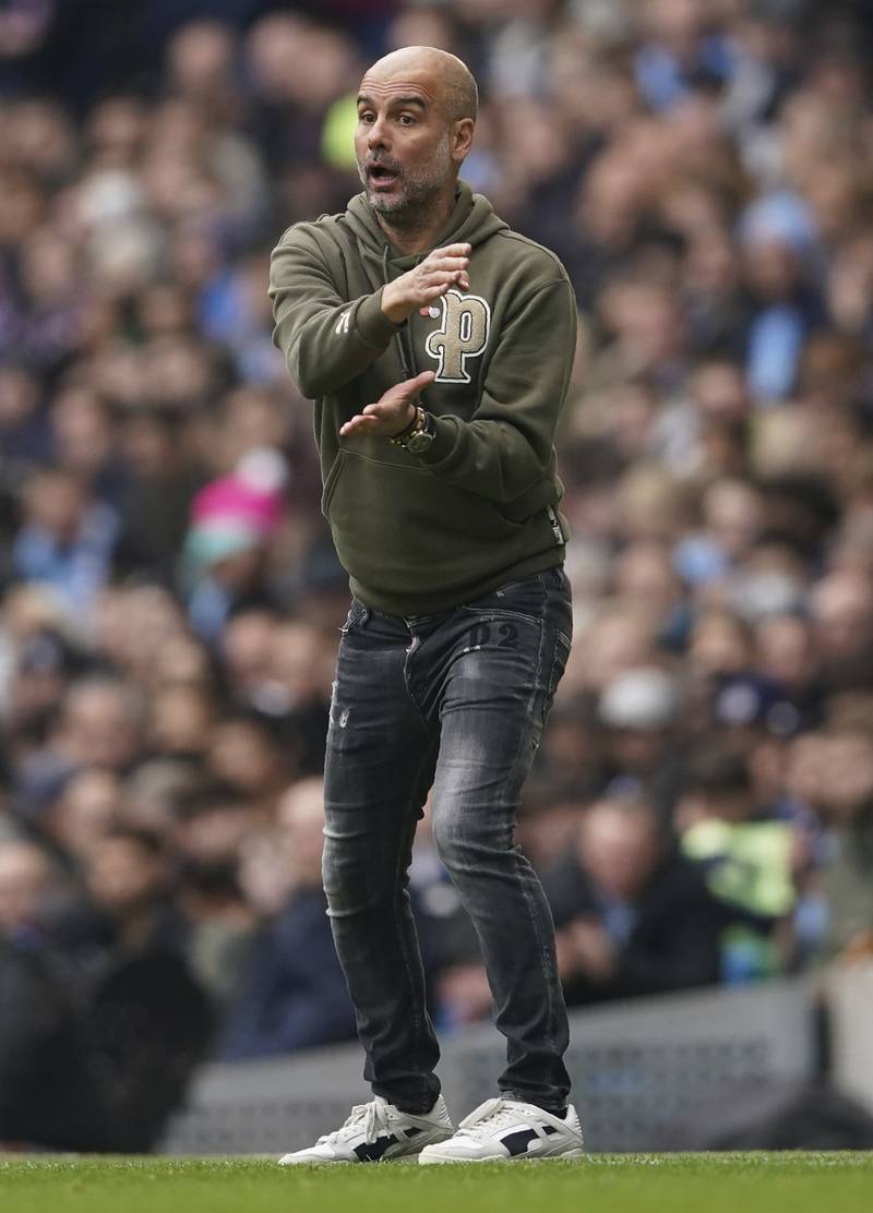 Manchester City coach Pep Guardiola gestures on the touchline. AP