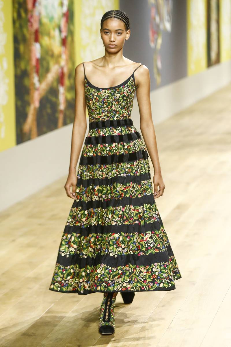 At Dior, Ukrainian folklore arrived as dense flowers stitched on to dresses. EPA