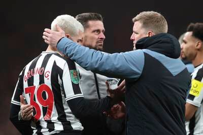 Newcastle manager Eddie Howe consoles Bruno Guimaraes after the final whistle. AP