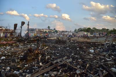 Destroyed homes after an explosion ripped through a firework warehouse in Thailand. AFP
