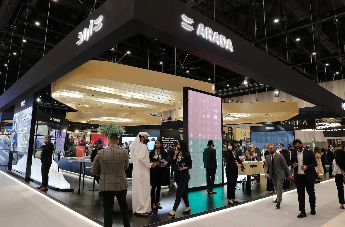 Visitors at the Arada stand on the first day of Cityscape Global, which was held at Dubai Exhibition Centre last year. Pawan Singh / The National