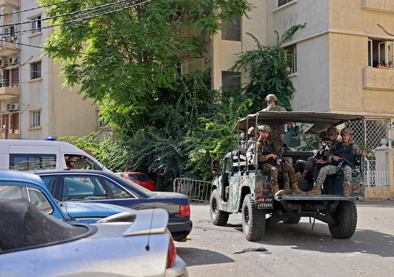 Gunfire killed at least two people and wounded several others at the rally organised by the Shiite Hezbollah and Amal movements to demand the dismissal of the Beirut blast lead investigator. AFP