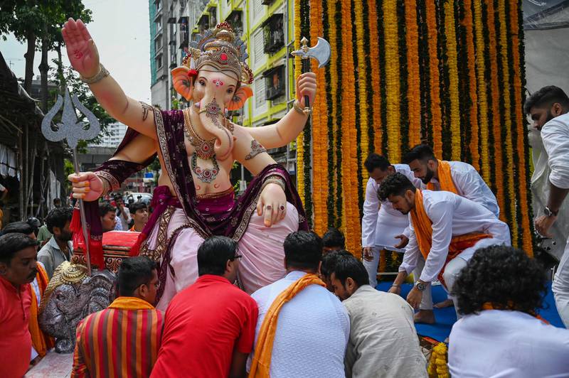 Hindu devotees were enjoying the festivities in the absence of coronavirus restrictions for the first time since 2019. AFP