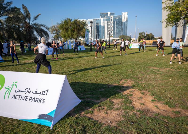 Abu Dhabi residents exercise in Al Khaleej Al Arabi park. Victor Besa / The National