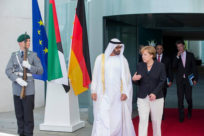ABU DHABI, UNITED ARAB EMIRATES - June 12, 2014: HH General Sheikh Mohamed bin Zayed Al Nahyan Crown Prince of Abu Dhabi and Deputy Supreme Commander of the UAE Armed Forces talks with Angela Merkel, German Chancellor after a meeting at the Chancellor's Office in Berlin, Germany.

( Donald Weber / Crown Prince Court - Abu Dhabi )
---