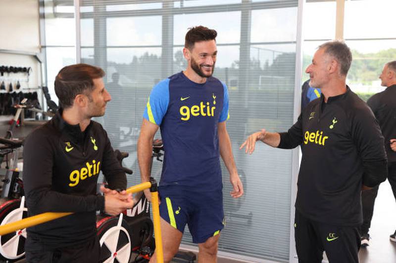Hugo Lloris of Tottenham Hotspur with fitness coaches Stefano Bruno and Costantino Coratti. Getty Images