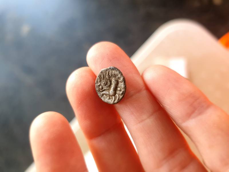 A Roman coin among the 9,000 artefacts recovered in the global crackdown on trafficked cultural goods. PA