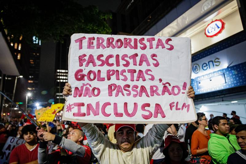 Demonstrators accuse Bolsonaro supporters of trying to stage a coup. Bloomberg