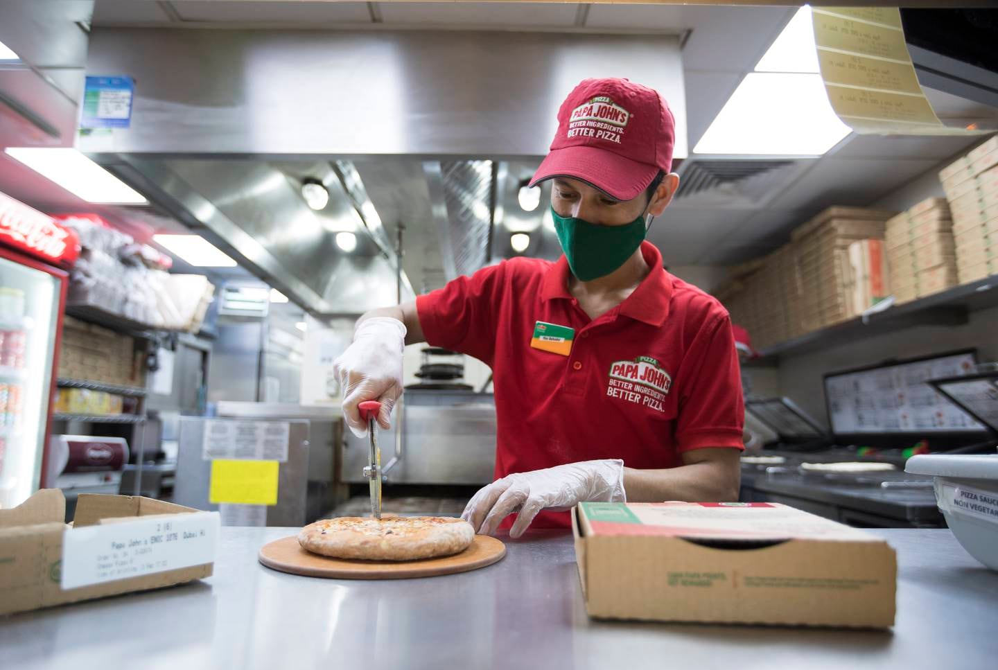 Papa John's Pizza in Dubai will take on students for part-time work. Ruel Pableo for The National