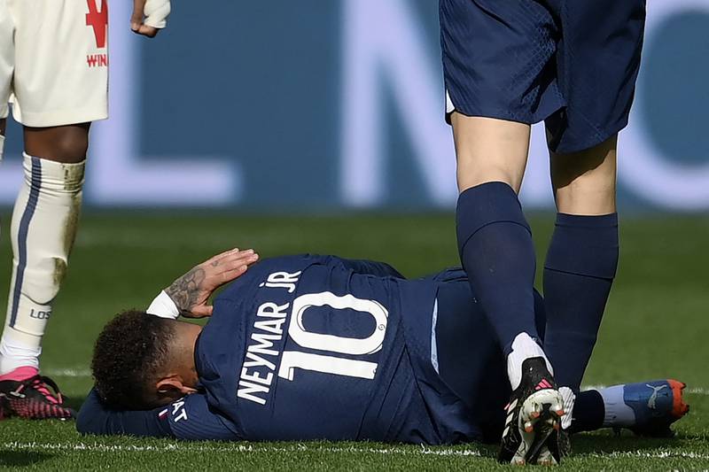 Neymar lies on the pitch after being injured against Lille. AFP