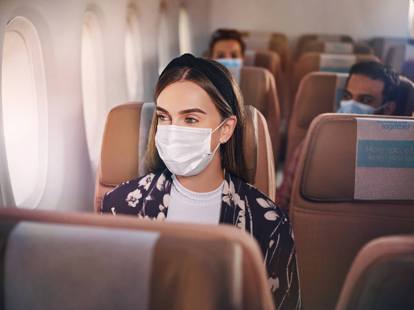 Travellers must wear face masks when flying to the UAE. Photo: Etihad 