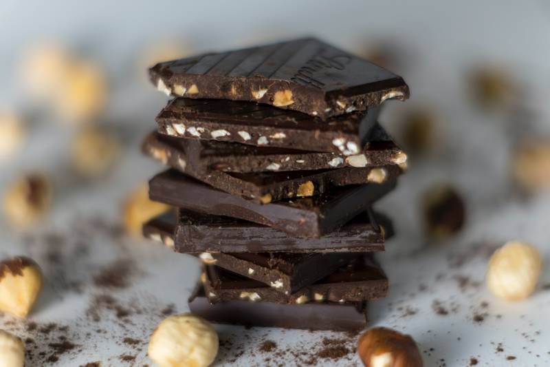 Experts say the chocolate industry is shrinking rainforests, emitting carbon dioxide, and fuelling climate change. Photo: Unsplash