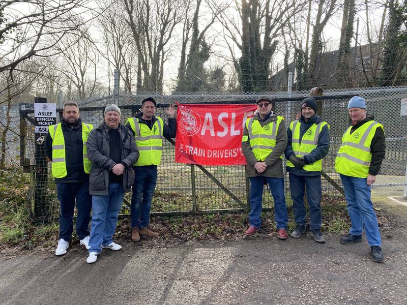 Aslef union members at a picket line outside Rickmansworth Underground station. PA