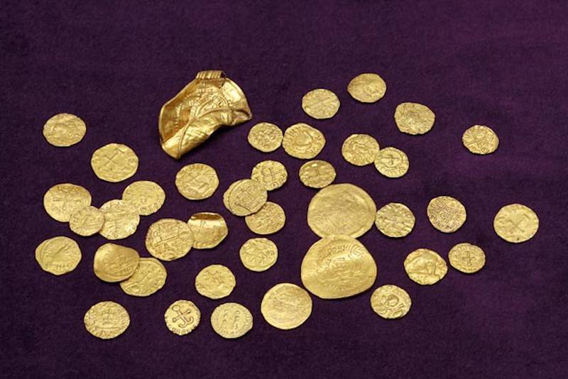 The gold coins, along with four other objects, unearthed by metal detectors in west Norfolk. Photo: PA