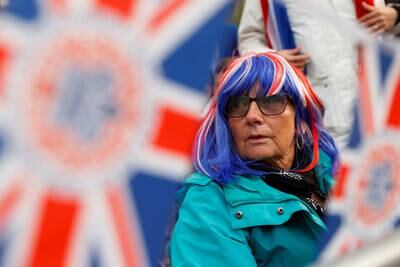 Colourful hair in The Mall as the crowds gather for King Charles's coronation procession. Reuters